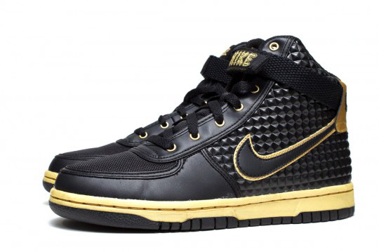 gold and black nike high tops